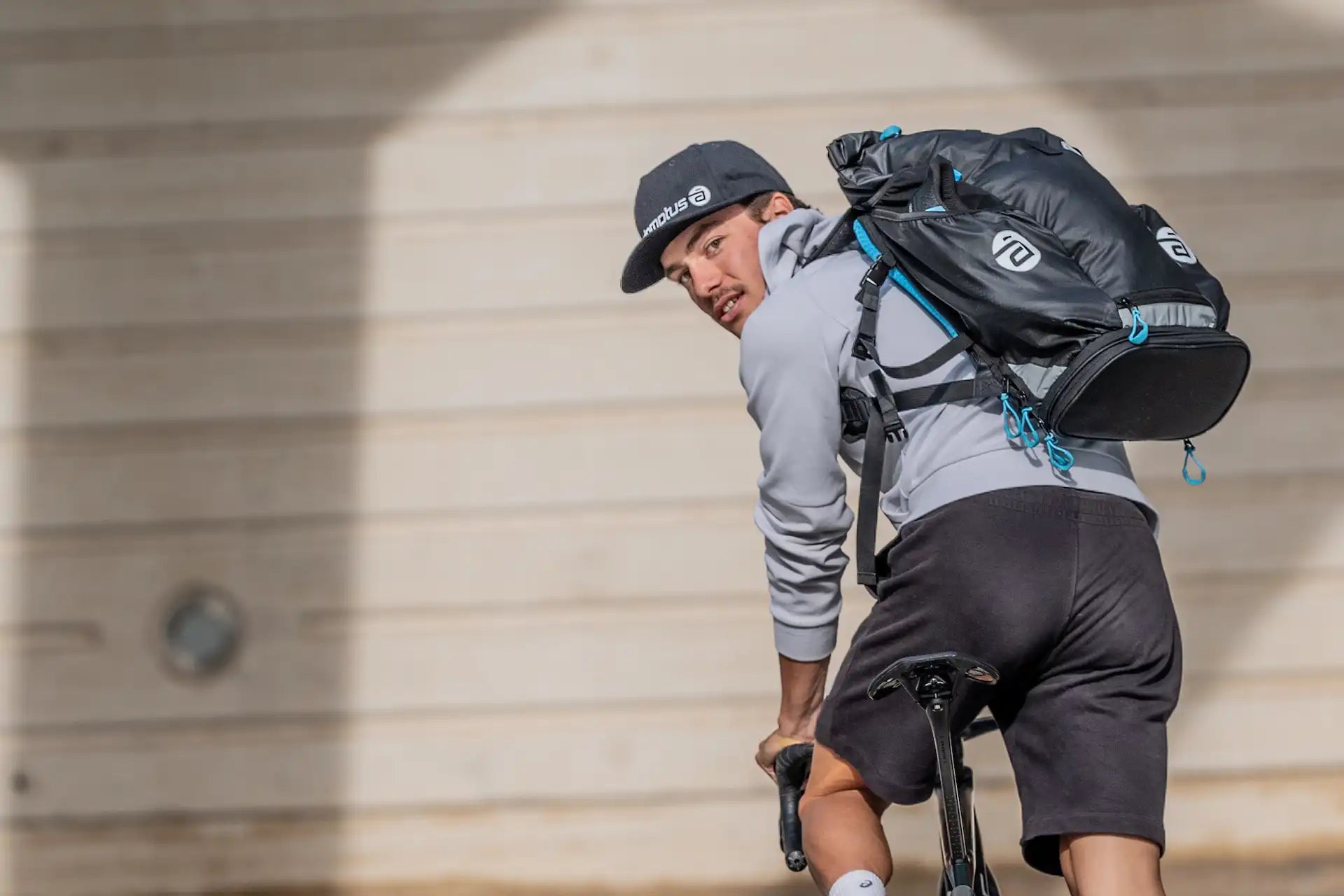 Transition bags with dedicated pockets for shoes and helmet